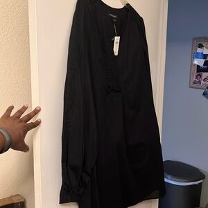 Black V neck above the knee new dress with embroidered design neck and sleeve.